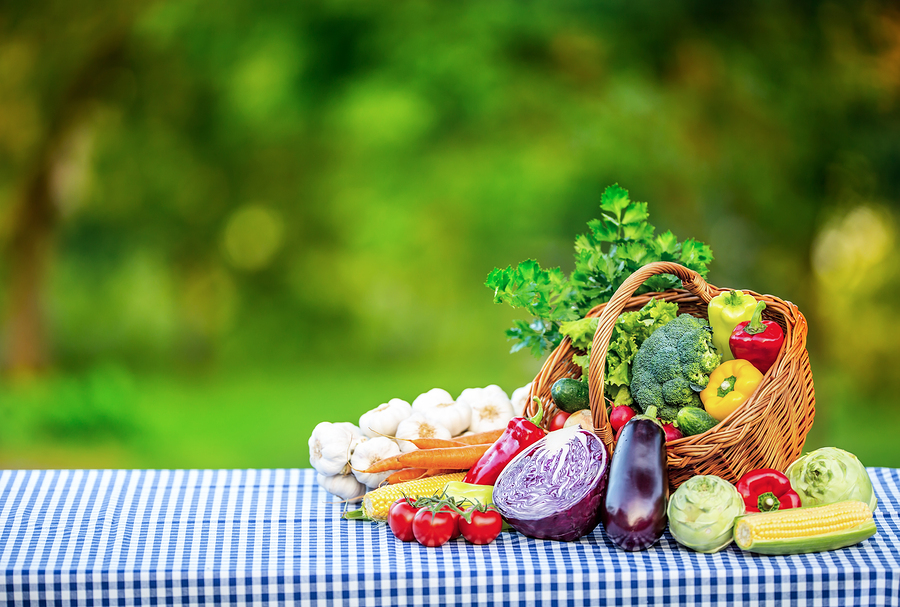 Basket with healthy vegetables on a table